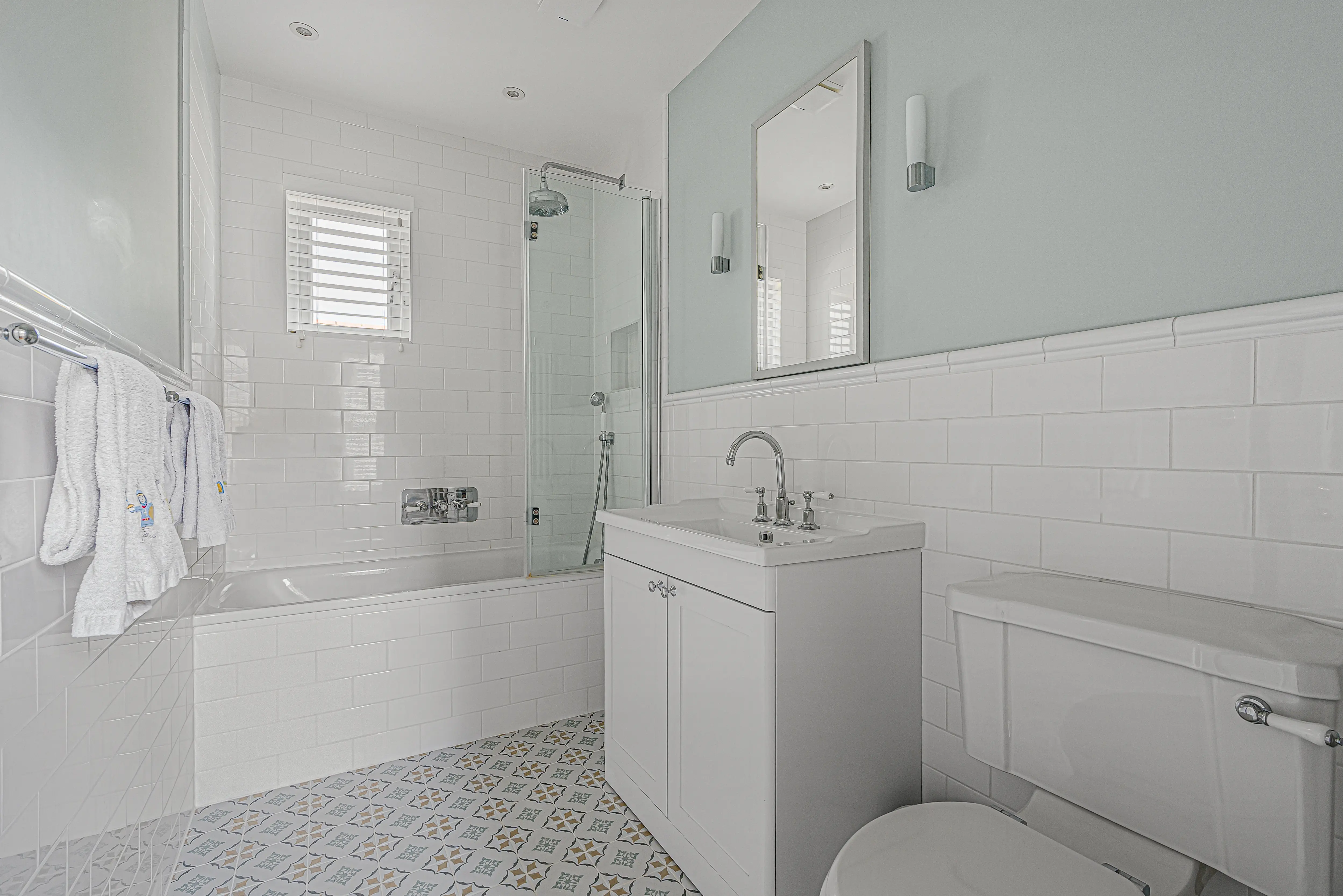 Timeless Kids Bathroom: White and Berlin Motif